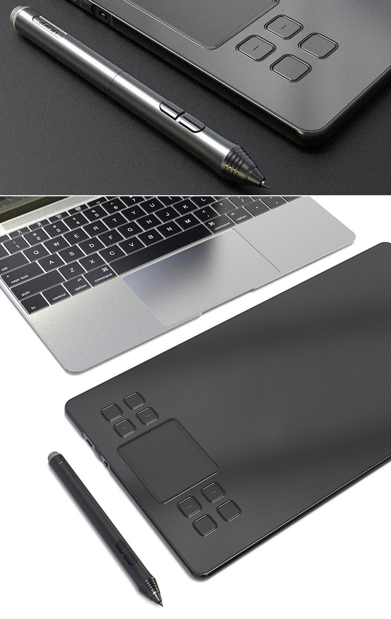 Czarny tablet graficzny z piórkiem na biurku
