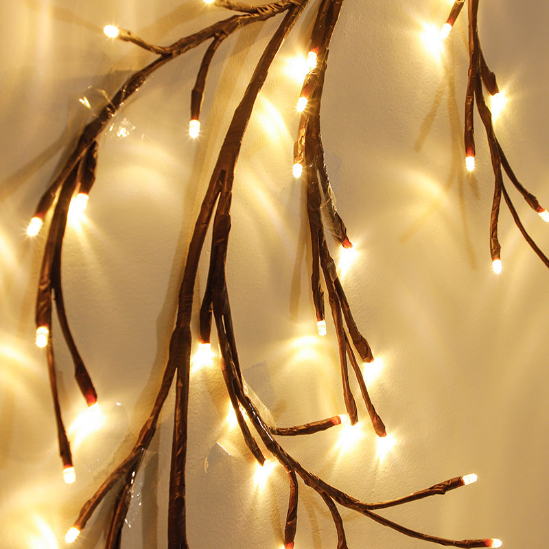 Rattanowe gałązki LED świecące na ścianie