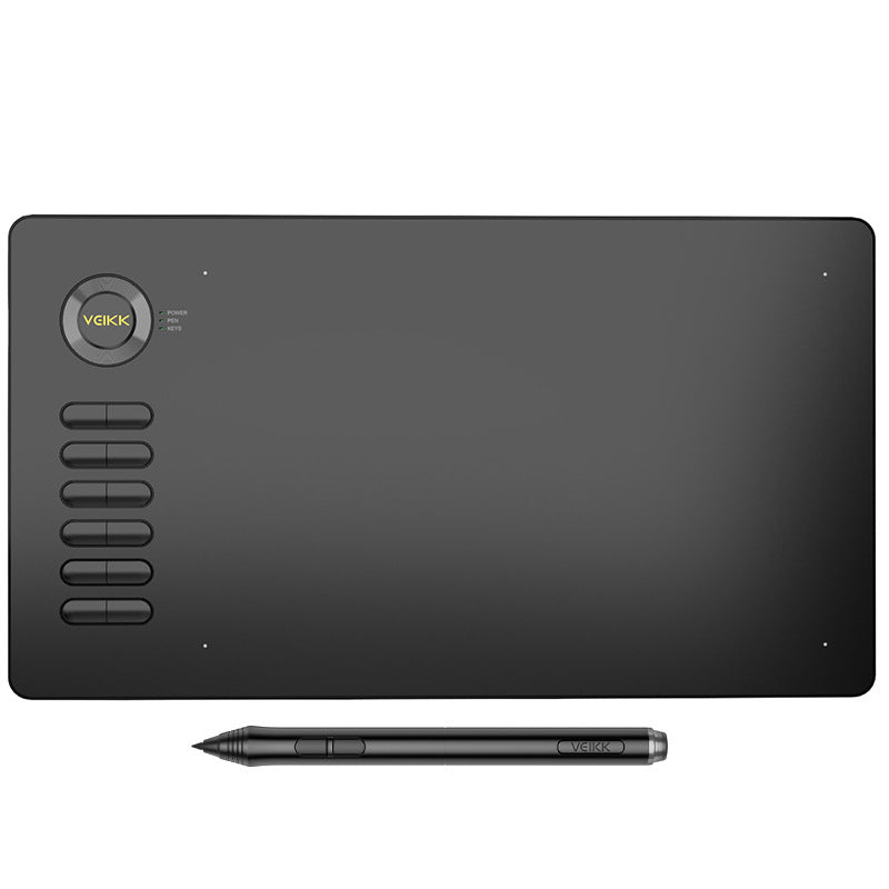 Czarny tablet graficzny z piórkiem na biurku