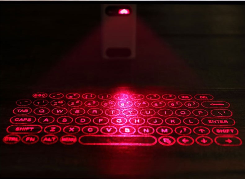 Laserowa klawiatura wyświetlona na biurku